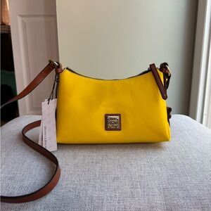 Dooney & Bourke NWT yellow crossbody bag with papers and dust bag